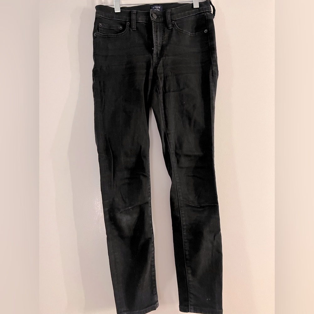 Black distressed J. Crew skinny jean, size 26